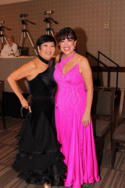 Two ladies in ballroom dance gowns